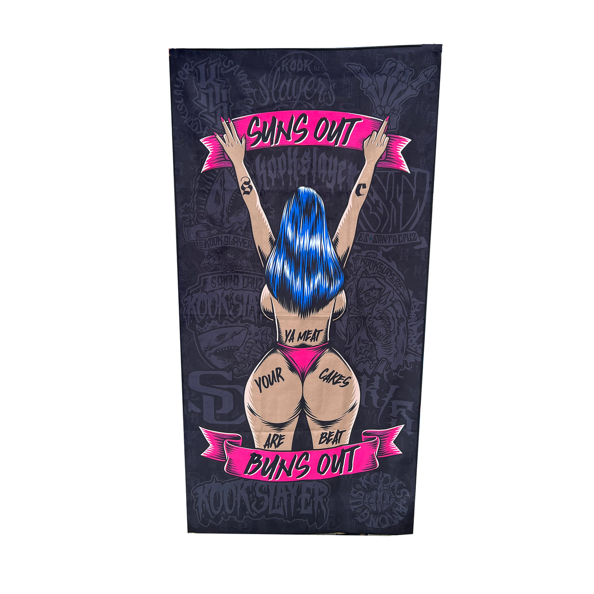 Kookslayer Beach Towel: a figure seen from behind with blue hair and raised arms, between pink Suns out and Buns out banners, on black printed with Kookslayer marks