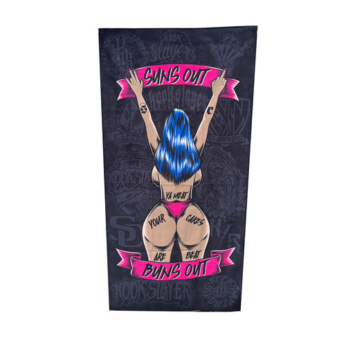 Kookslayer Beach Towel: a figure seen from behind with blue hair and raised arms, between pink Suns out and Buns out banners, on black printed with Kookslayer marks