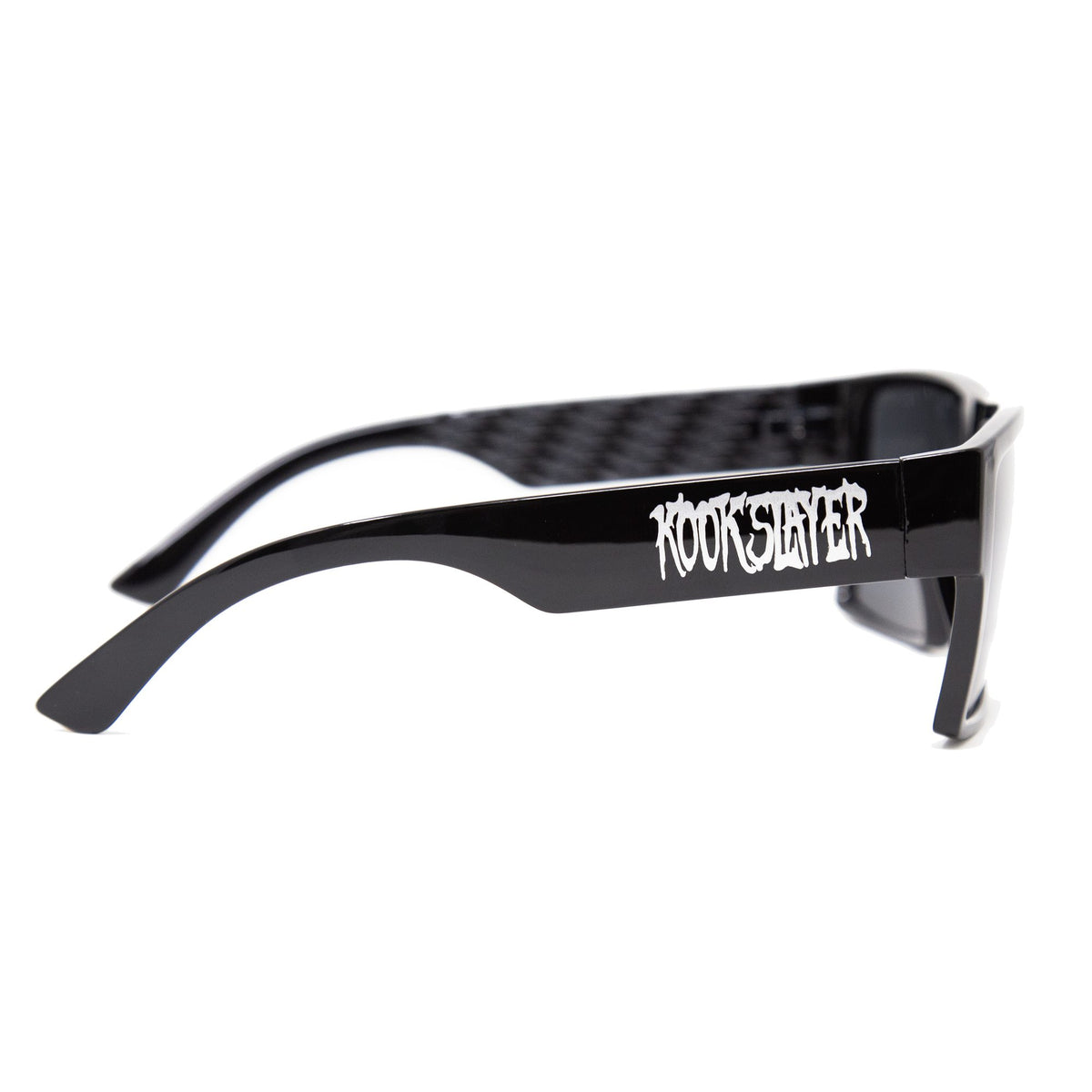 Kookslayer sunglasses with Kookslayer lettering on the arm and checkered inner arms — angled